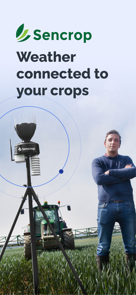 Un agriculteur se tenant à côté d'une station météo Sencrop dans un champ de culture avec un tracteur à l'arrière-plan