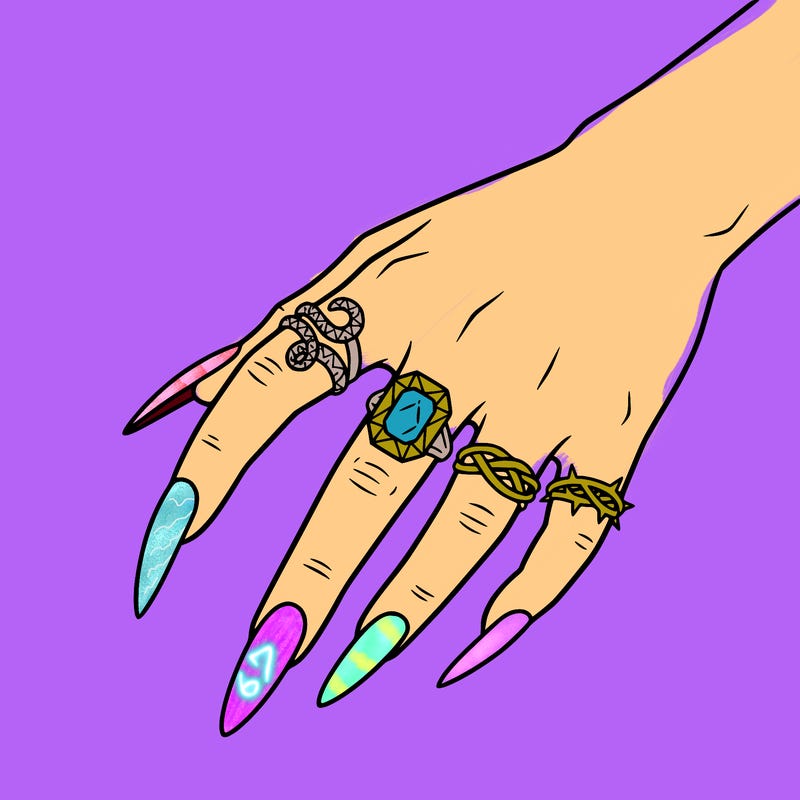 hand, with long nails, and rings