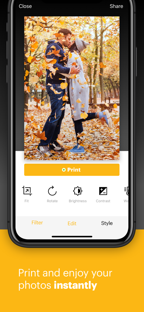 KODAK SMILE - The KODAK SMILE app interface showing tools for editing and printing a romantic photo with an autumn theme.