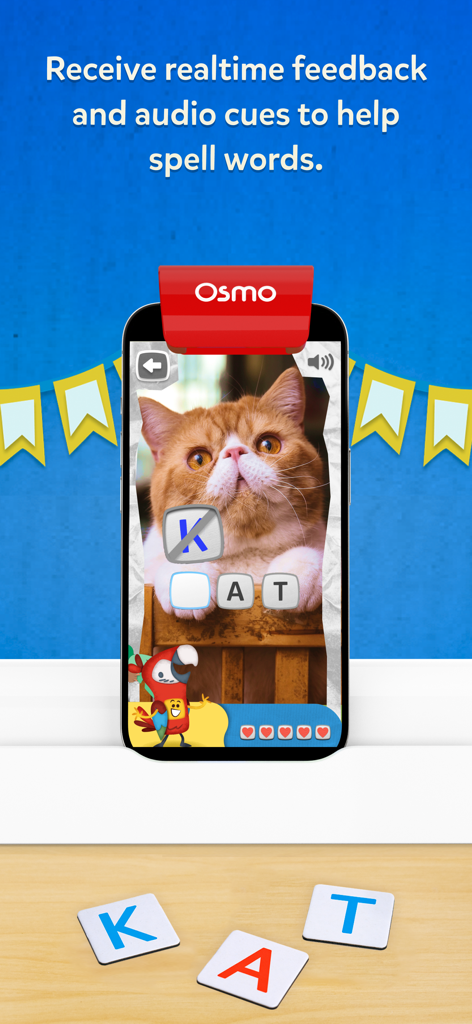 Osmo Words app interface showing real-time feedback for spelling the word cat with physical letter tiles