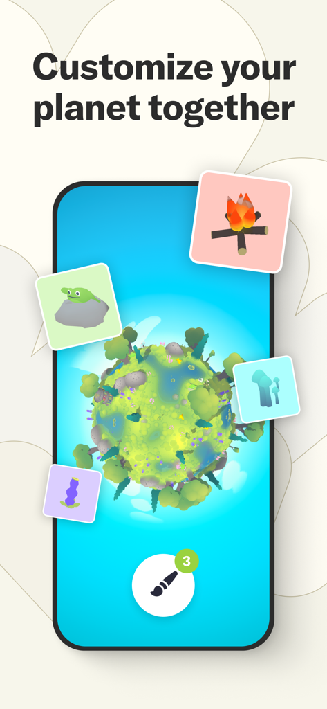 A smartphone screen displaying the Tolan app feature to customize a digital planet with creative elements like a campfire and a frog.