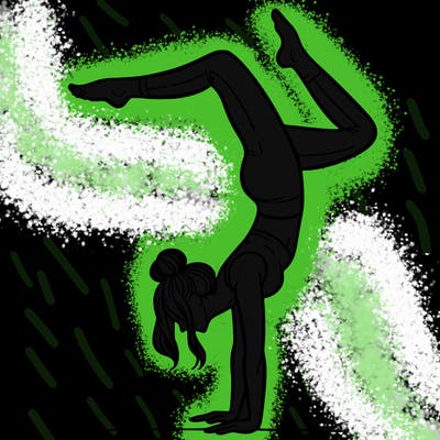 a woman doing a handstand