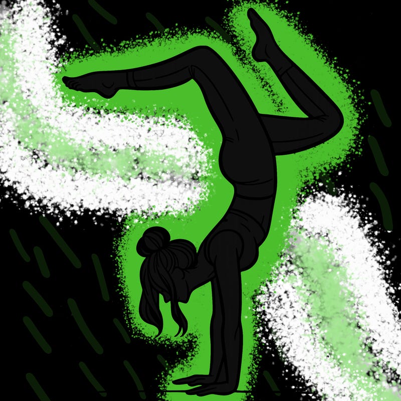 a woman doing a handstand