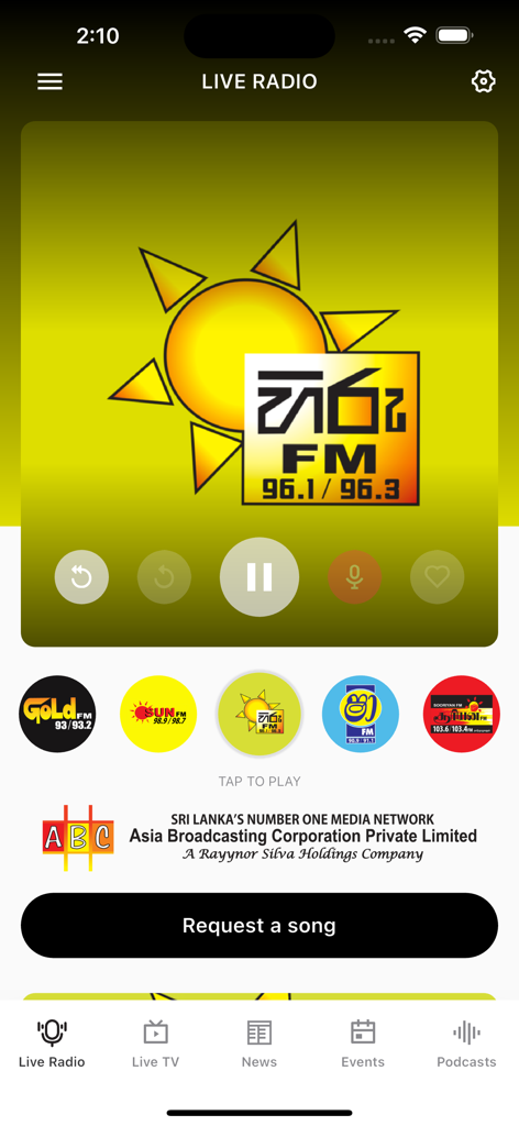 GoldFM Mobile - GoldFM Mobile app live radio screen with station icons and song request button