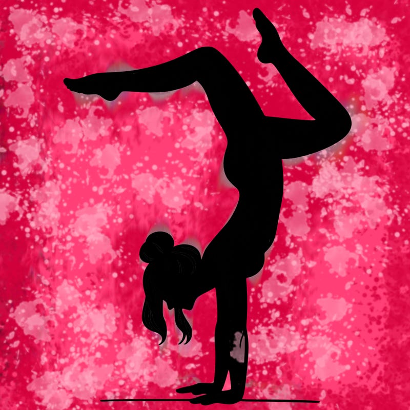 a woman doing a handstand