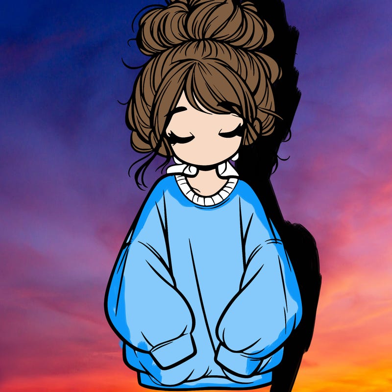 girl with baggy sweatshirt and messy bun