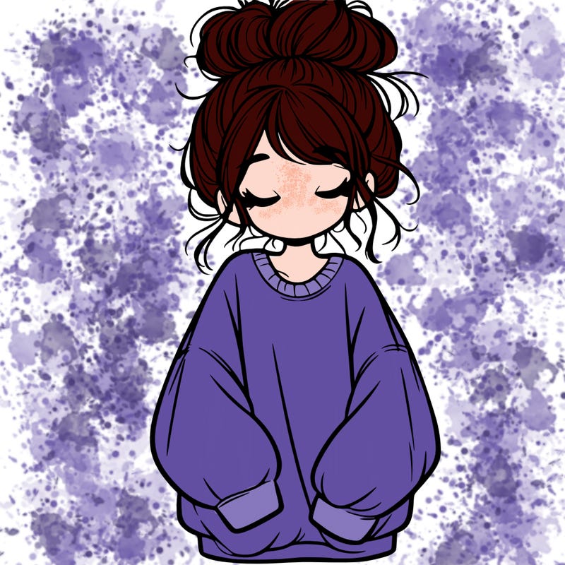 girl with baggy sweatshirt and messy bun