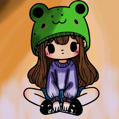 a girl wearing a frog hat and some frog socks