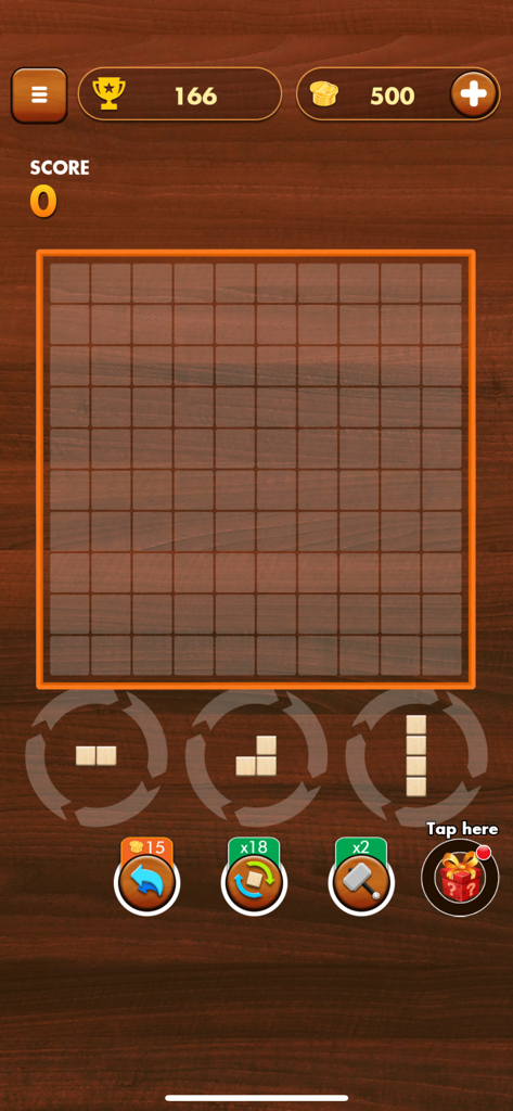 Gameplay screen of Woody Extreme showing a wooden block puzzle grid and boosters