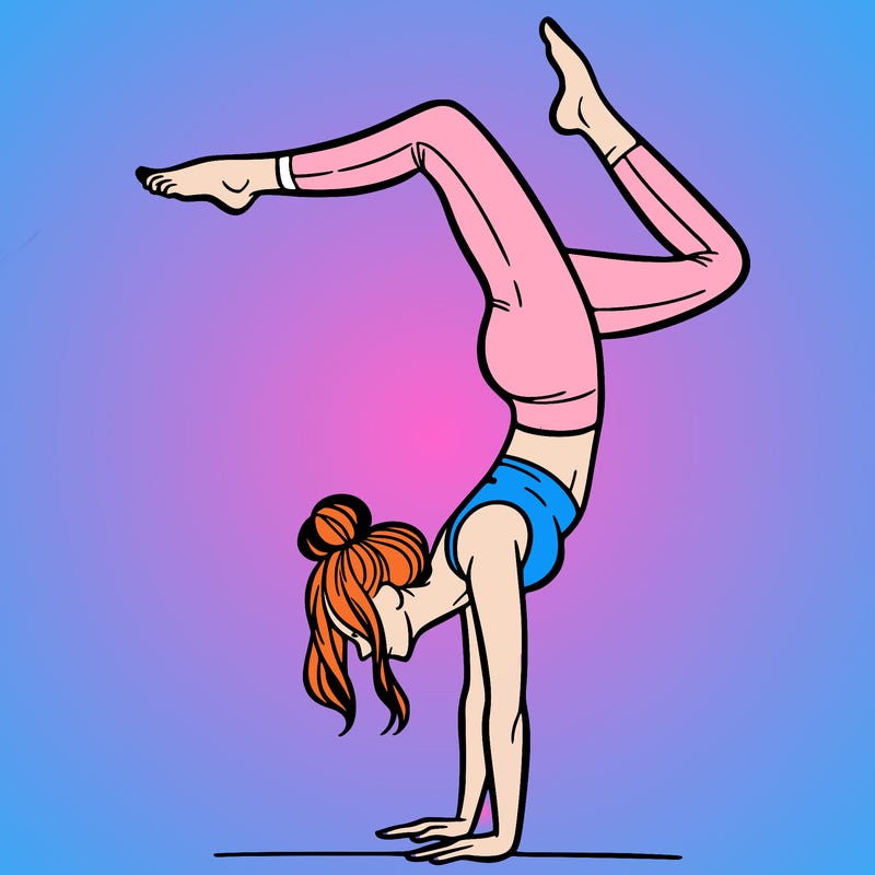 a woman doing a handstand
