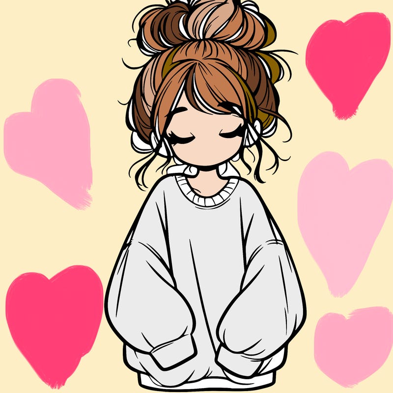girl with baggy sweatshirt and messy bun