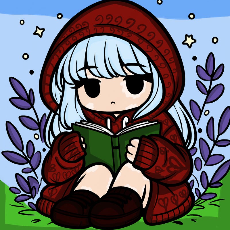 girl in oversized hoodie reading a book