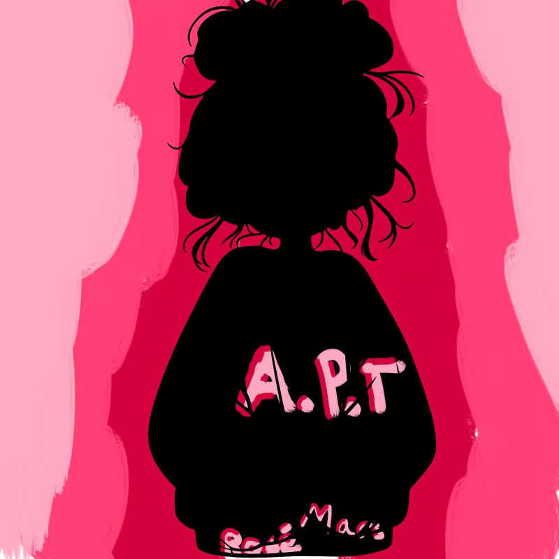 girl with baggy sweatshirt and messy bun