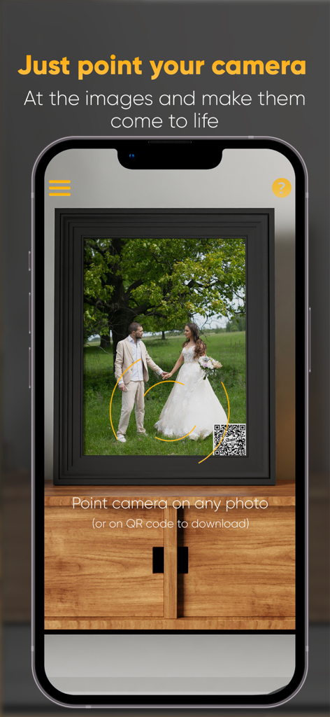 Stories AR - Stories AR app scanning a framed wedding picture with a QR code