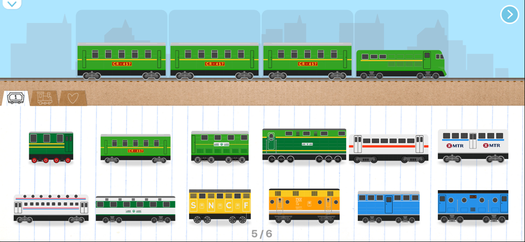 Selection menu showing various colorful train car templates and a completed green train on a track.