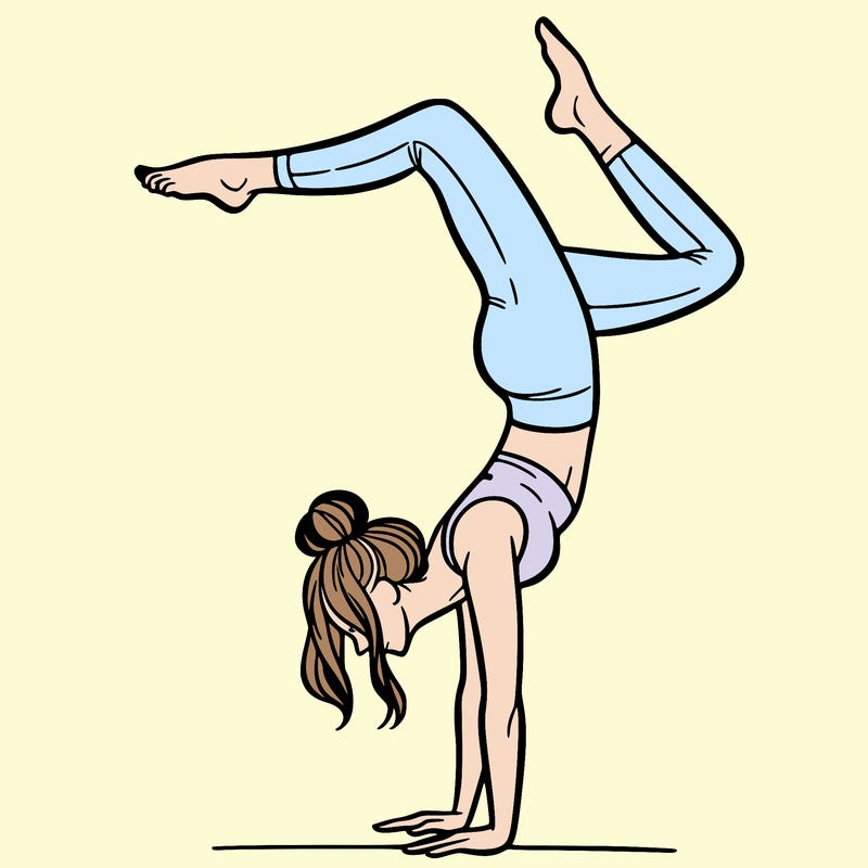 a woman doing a handstand