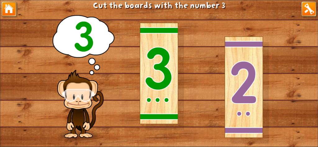 A monkey wearing safety goggles teaching number recognition by identifying boards with the number three.