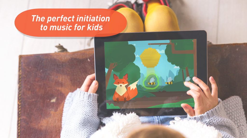 Easy Music - Give kids an ear for music - A child using the Easy Music educational app on a tablet featuring a nature-inspired animation with a fox and bees.
