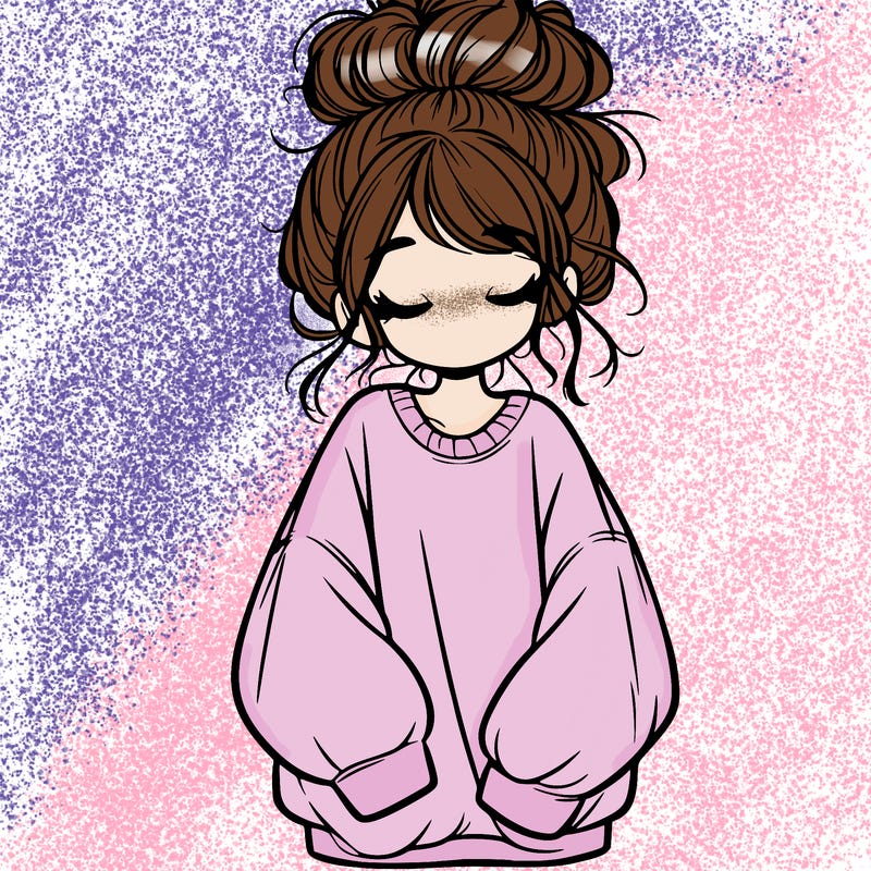 girl with baggy sweatshirt and messy bun
