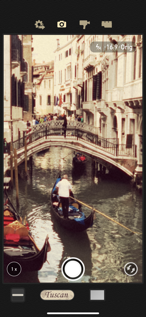 8mm Vintage Camera - A Venice canal scene captured with a vintage film effect using the Tuscan filter in the 8mm Vintage Camera app