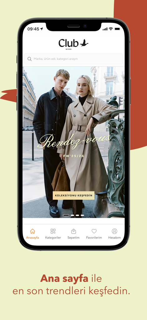 The home screen of the Beymen Club mobile app displaying a male and female model in sophisticated autumn fashion.