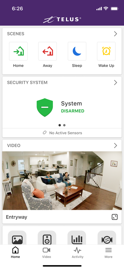 Dashboard of the TELUS SmartHome app displaying scene controls, security system status, and a live video feed of a home entryway.