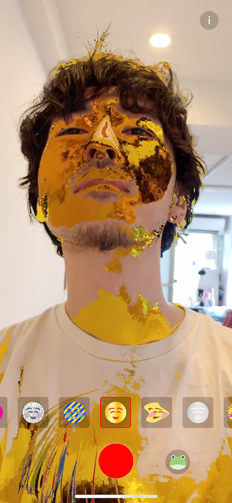 MEISAI - AR Filter - A creative gold liquid AR filter applied to a persons face and clothes in the MEISAI app