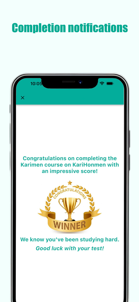 KariHonmen - Karimen & Honmen - Pantalla de felicitación en la aplicación KariHonmen que muestra un trofeo dorado de ganador por completar el curso de Karimen.