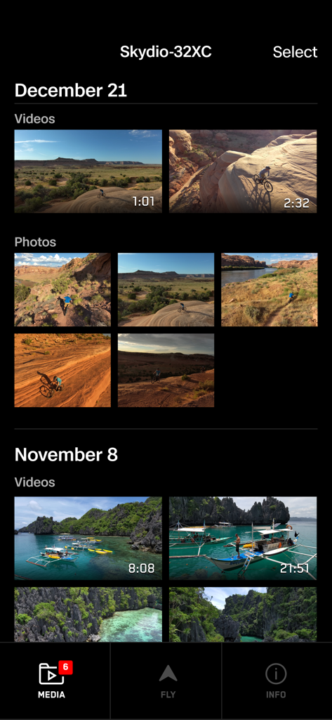 Skydio-App-Medien-Galerie-Oberfläche mit aufgenommenen Drohnenvideos und -fotos von Outdoor-Abenteuern