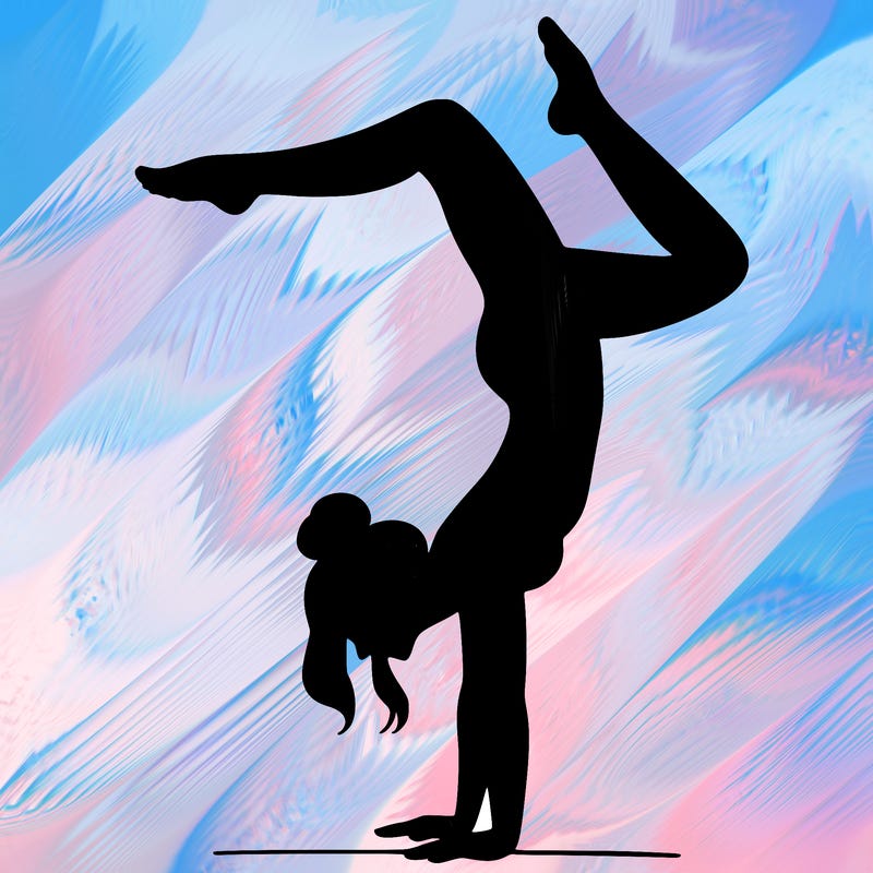 a woman doing a handstand