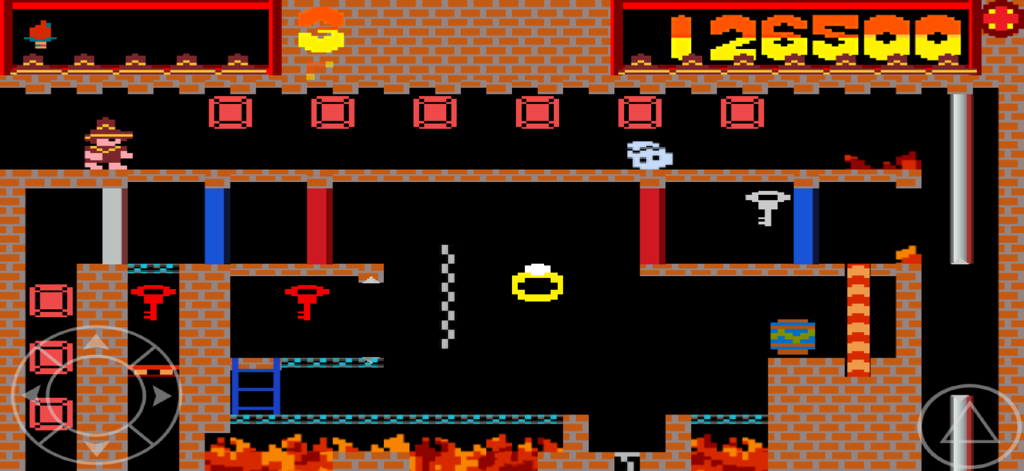 モンテズマ ディレクターズカットのレトロ8ビット2Dプラットフォーマーゲームプレイ。キャラクターのペドロがピクセルアートのピラミッドレベルをナビゲートしている様子。