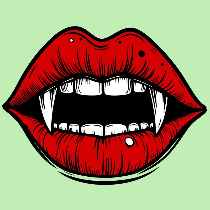 lips with vampire teeth