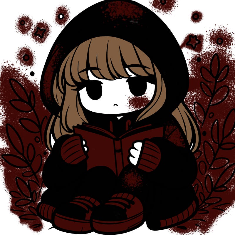 girl in oversized hoodie reading a book