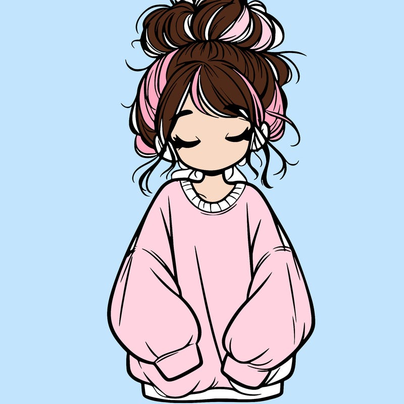 girl with baggy sweatshirt and messy bun