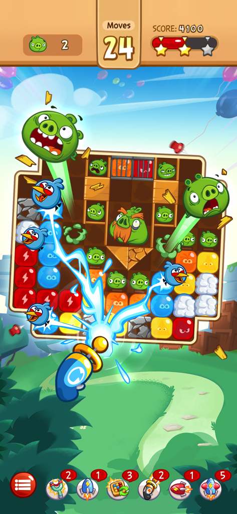 Angry Birds Blast - Angry Birds Blast mobile puzzle gameplay showing a laser gun booster clearing balloons.