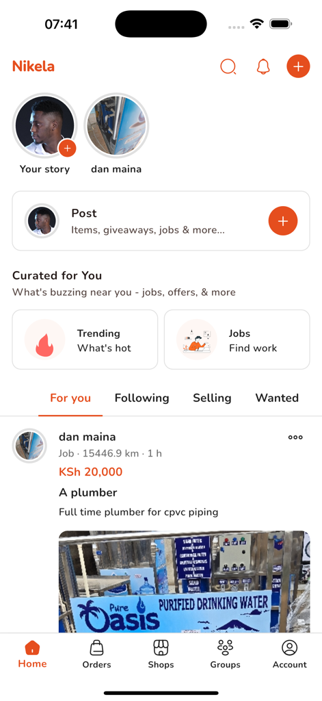 Nikela app home screen displaying a community marketplace feed with job listings and service offerings.