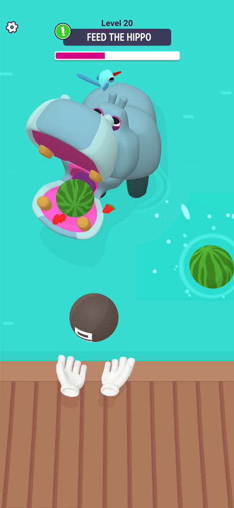 Zoo - Happy Animals - A colorful mini game screenshot of Zoo Happy Animals where a player is feeding watermelons to a hippopotamus