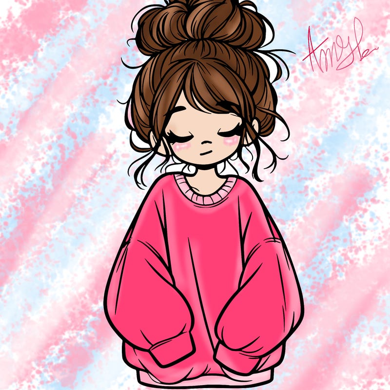 girl with baggy sweatshirt and messy bun