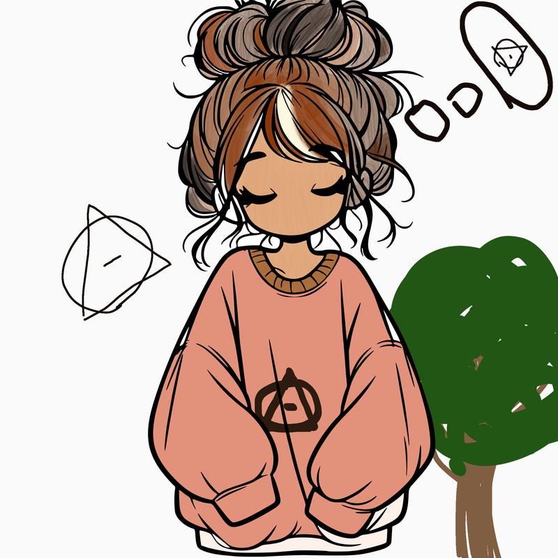 girl with baggy sweatshirt and messy bun