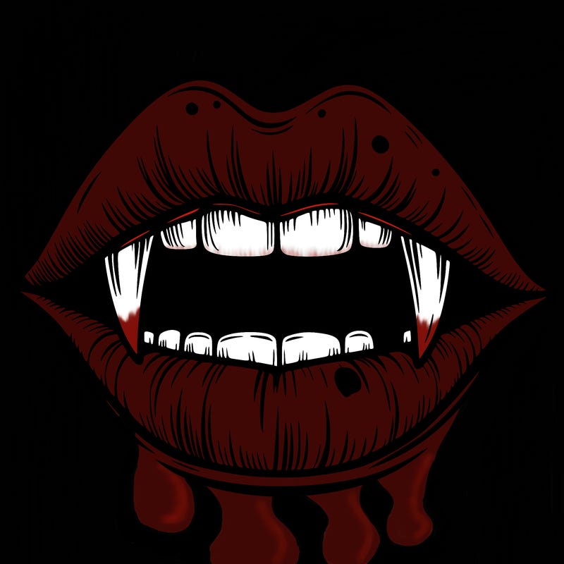 lips with vampire teeth