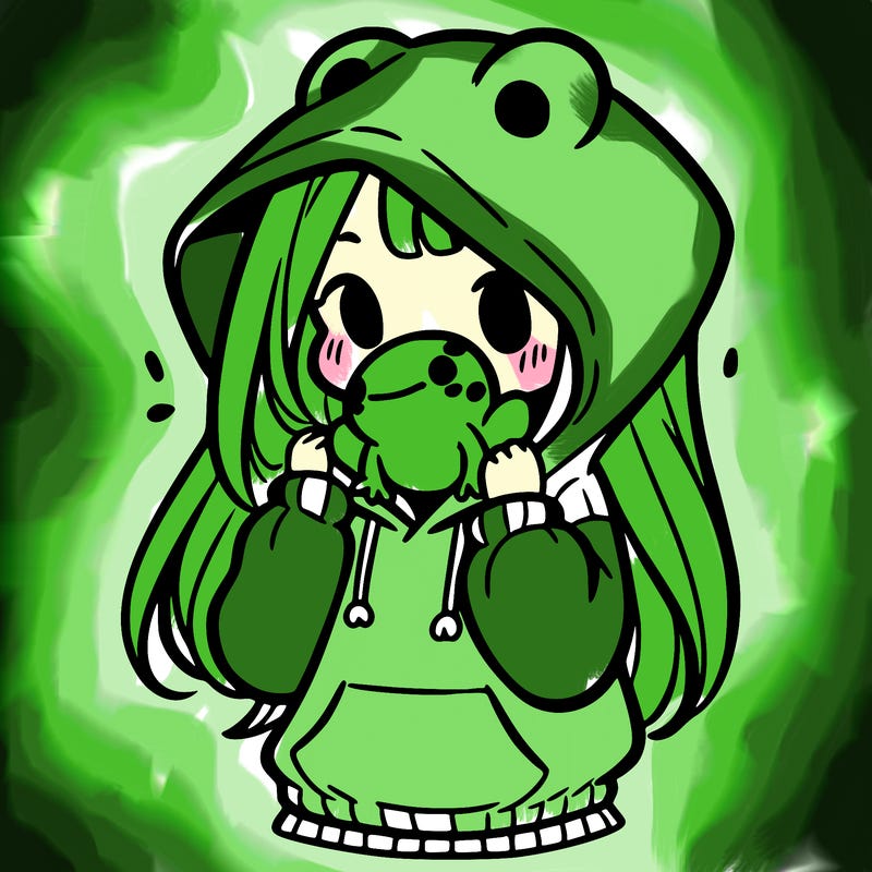 a girl holding a froggy hoodie