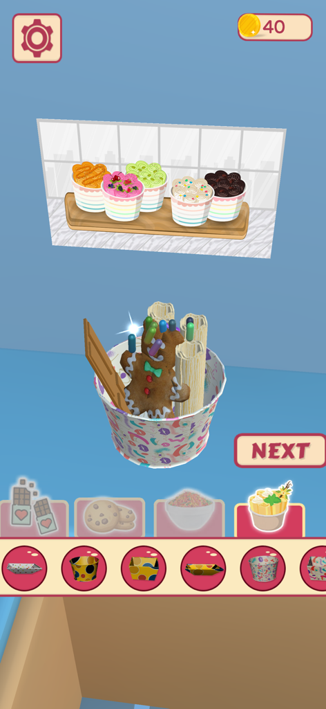 Captura de pantalla del juego Ice Cream Rolls ASMR Maker mostrando una taza de rolls decorada con una galleta de hombre de jengibre y una barra de chocolate