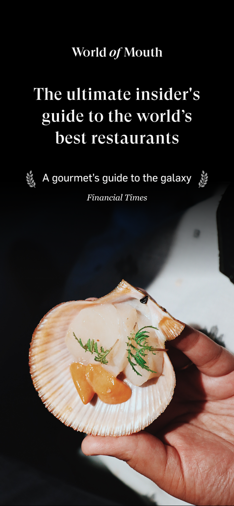 A hand holding a gourmet scallop in a shell promoting the World of Mouth restaurant guide app