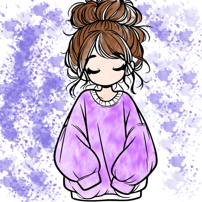 girl with baggy sweatshirt and messy bun