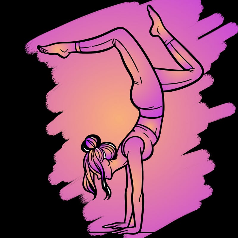 a woman doing a handstand