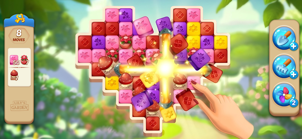 Lily’s Garden: Match & Design - Lily's Garden에서 빛나는 부스터 효과가 있는 하트 모양의 매치 3 폭파 퍼즐