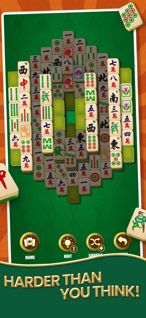Mahjong Solitaire - Master - Un nivel desafiante de Mahjong Solitaire Master con intrincados arreglos de fichas en un tablero verde.