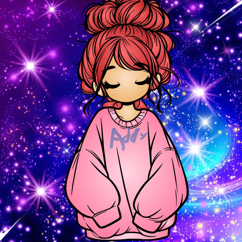 girl with baggy sweatshirt and messy bun