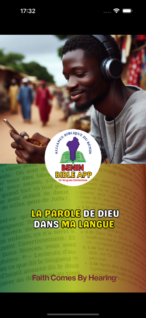 Benin Bible - Man wearing headphones listening to the Bible in his native Beninese language on his mobile phone