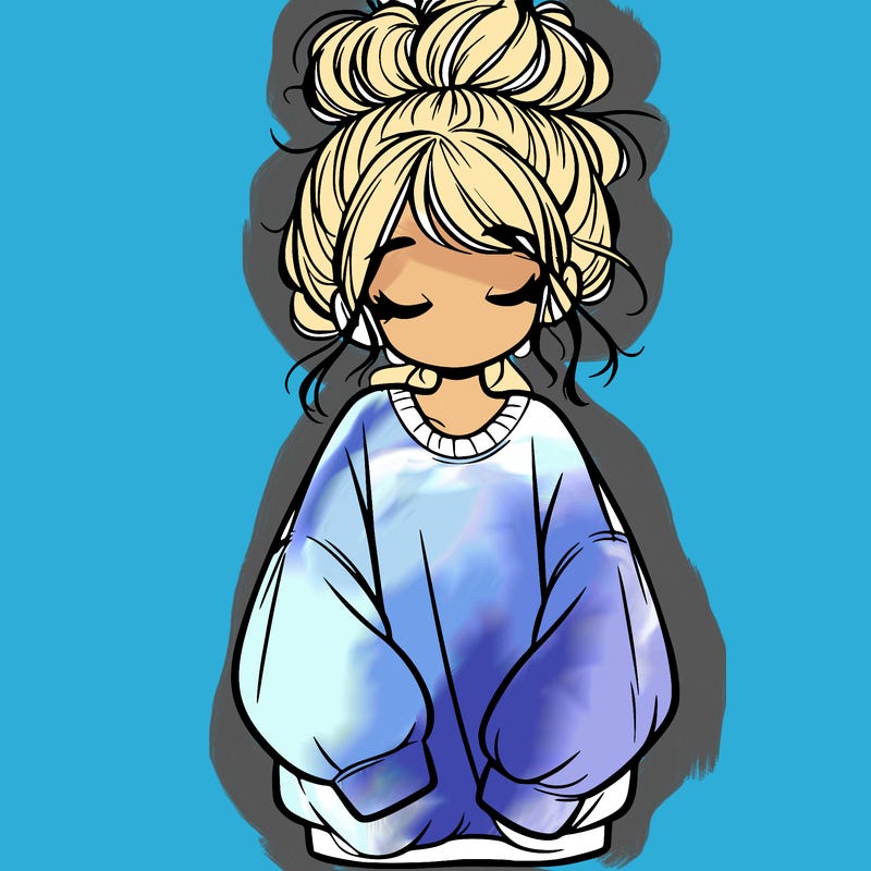 girl with baggy sweatshirt and messy bun